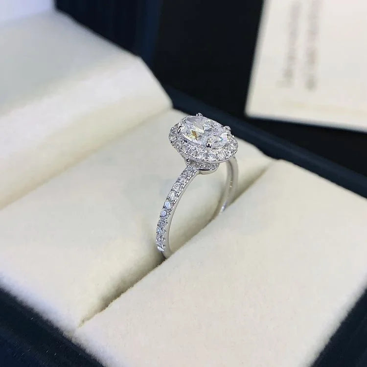 1 Carat Oval Lab Diamond Halo Solitaire Half Pave Engagement Ring in 18K White Gold